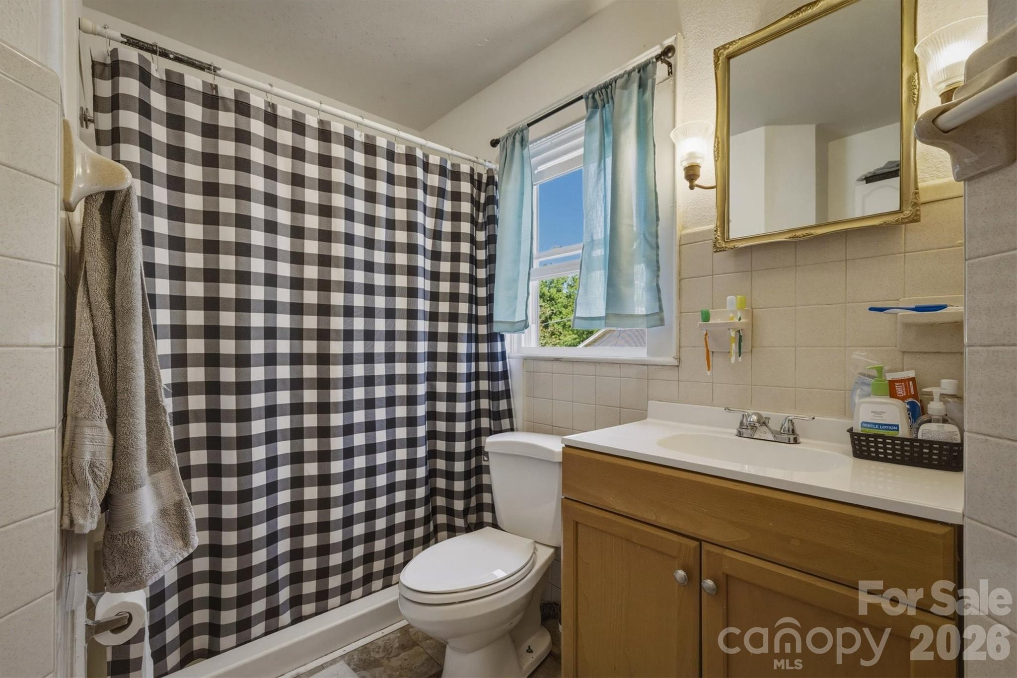 117 3rd Avenue Southwest Hickory, NC 28602 - Photo 19 of 21 a bathroom with a sink toilet and shower