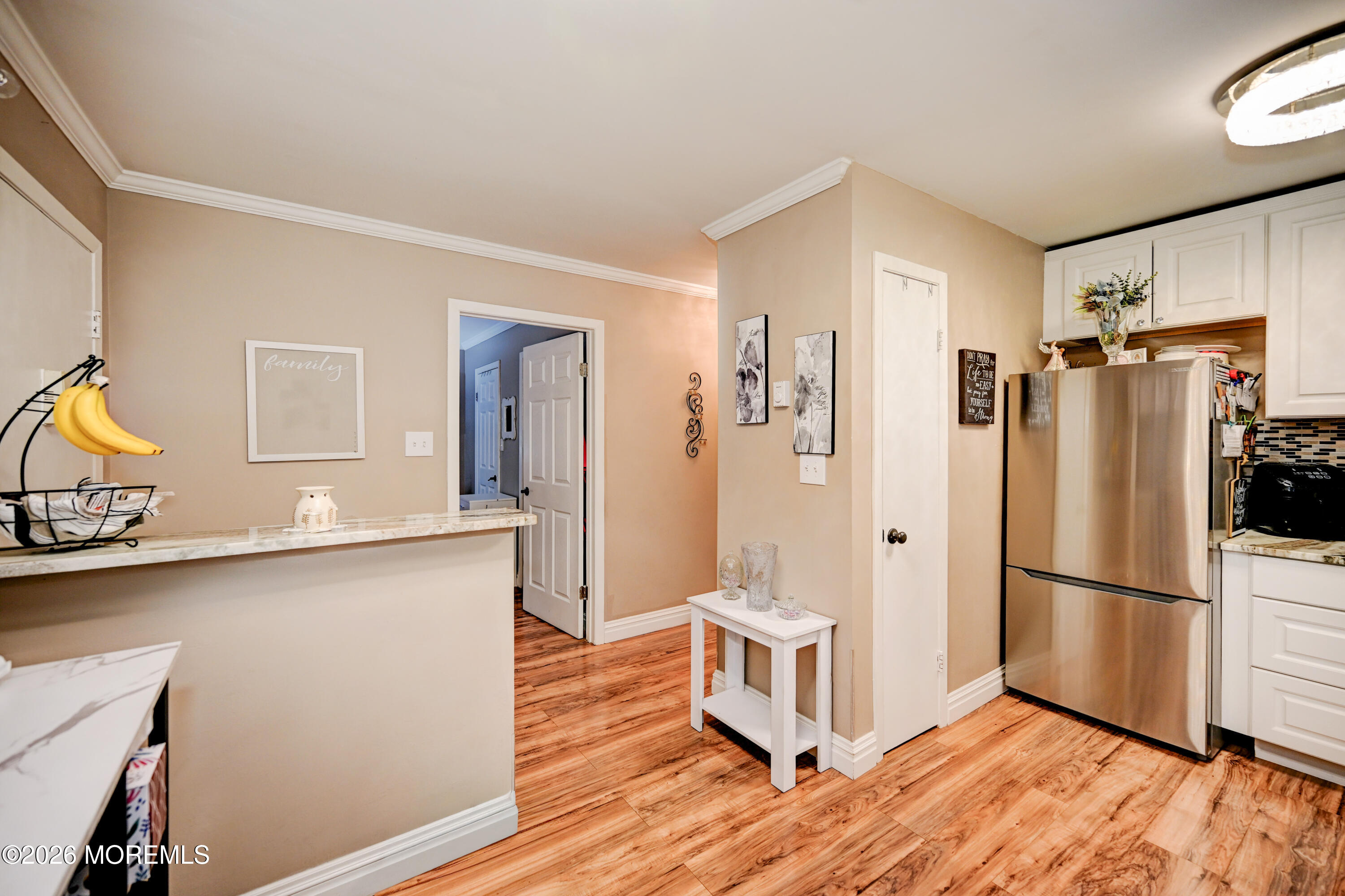 88 Arrowood Road, Unit B Manalapan, NJ 07726 - Photo 9 of 29 09-Kitchen to Hallway