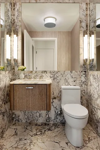 a bathroom with a sink and mirror