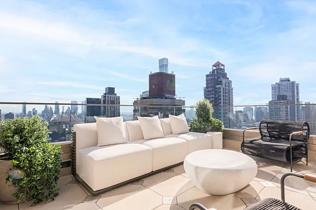 a bathroom with a sink toilet and mirror