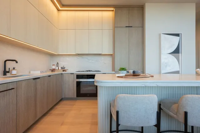a kitchen with sink cabinets and a table