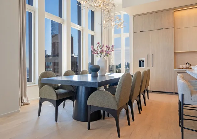 a kitchen with a stove a sink and a refrigerator