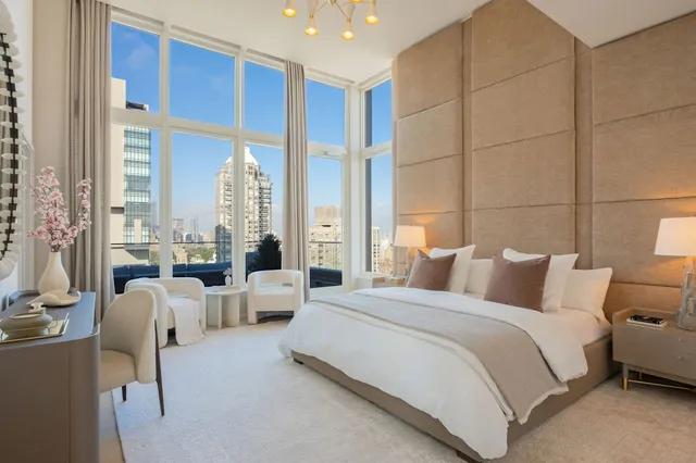 a view of a workspace with furniture