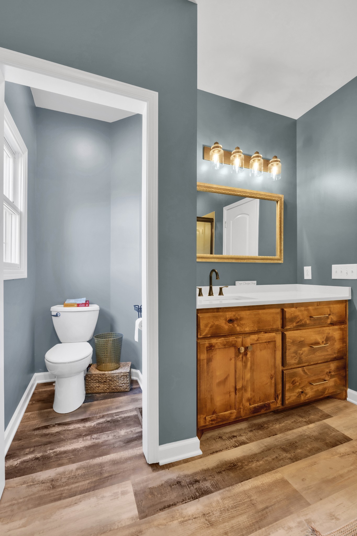 3988 Fykes Grove Road Cedar Hill, TN 37032 - Photo 33 of 50 a bathroom with a sink and a mirror