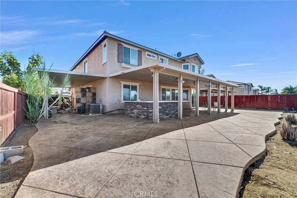 18388 Hidden Ranch Road Riverside, CA 92508 - Photo 43 of 46 a front view of a house with yard and trees in the background