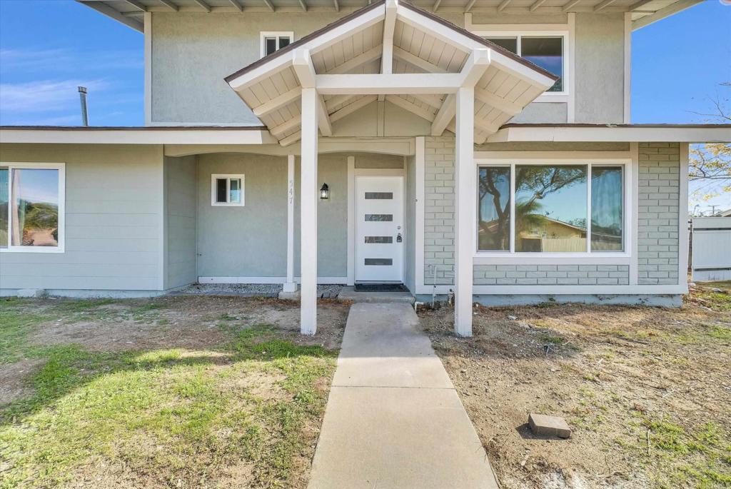 547 North Fillmore Avenue Rialto, CA 92376 - Photo 27 of 30 a view of a brick house with many windows
