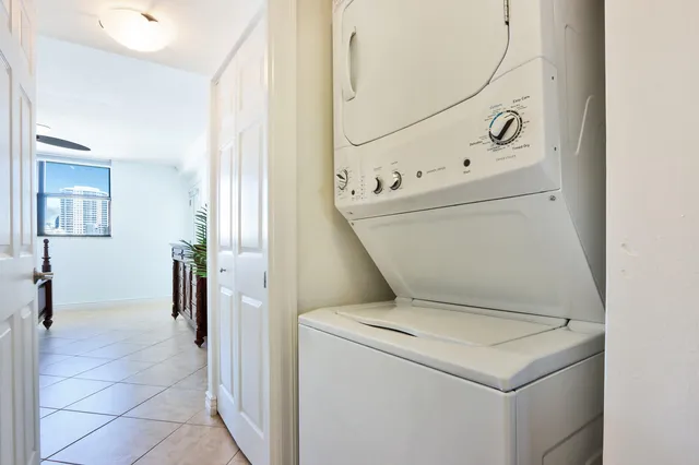 a bathroom with a tub and shower