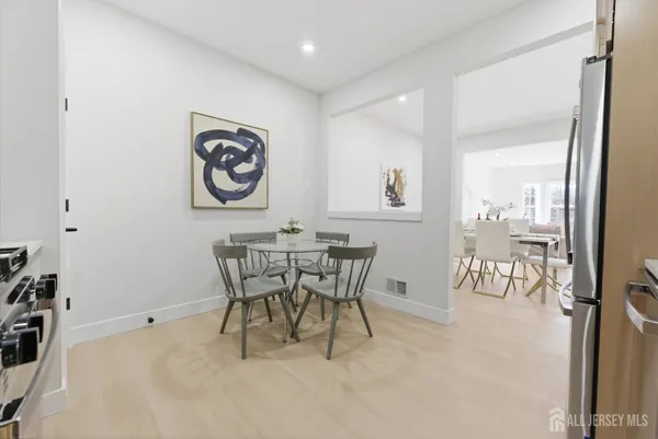 a view of a dining room with furniture