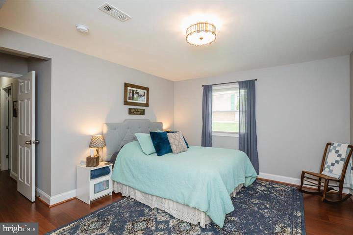 814 Foxwell Road Joppa, MD 21085 - Photo 12 of 23 a bedroom with a bed and a window
