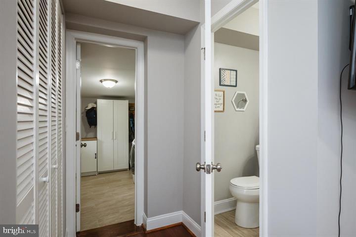 814 Foxwell Road Joppa, MD 21085 - Photo 17 of 23 a bathroom with a granite countertop toilet and a sink