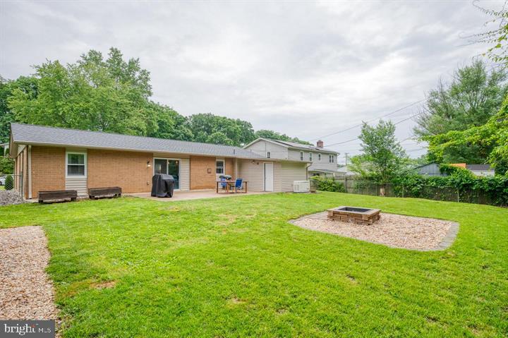 814 Foxwell Road Joppa, MD 21085 - Photo 20 of 23 a front view of house with yard and green space
