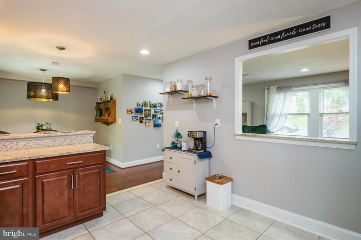 814 Foxwell Road Joppa, MD 21085 - Photo 7 of 23 a kitchen with stainless steel appliances a sink stove and cabinets
