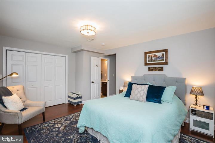 814 Foxwell Road Joppa, MD 21085 - Photo 10 of 23 a bedroom with a bed and wooden floor