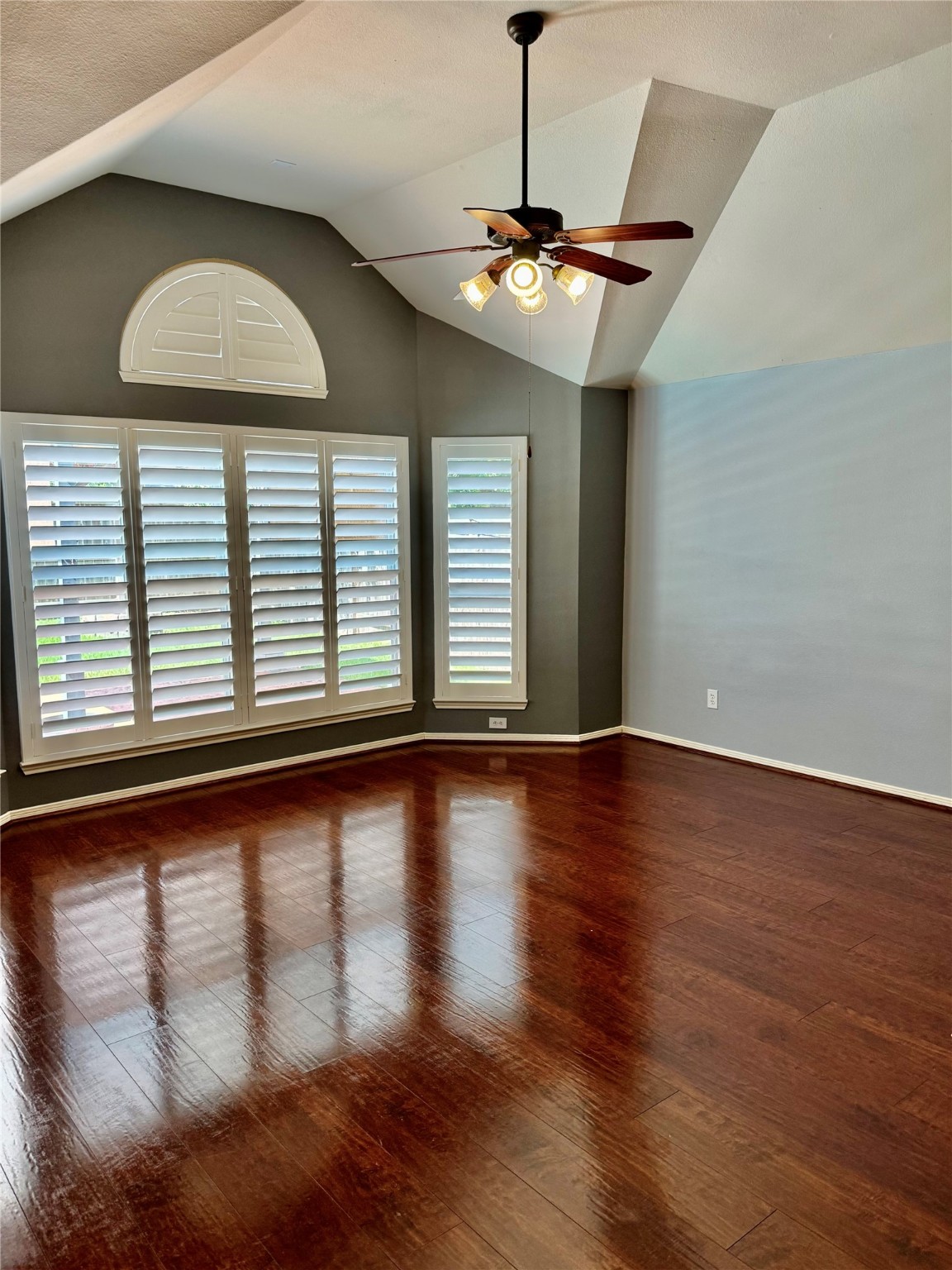 15434 Bay Tree Landing Cypress, TX 77429 - Photo 15 of 39 a view of an empty room with wooden floor and a window