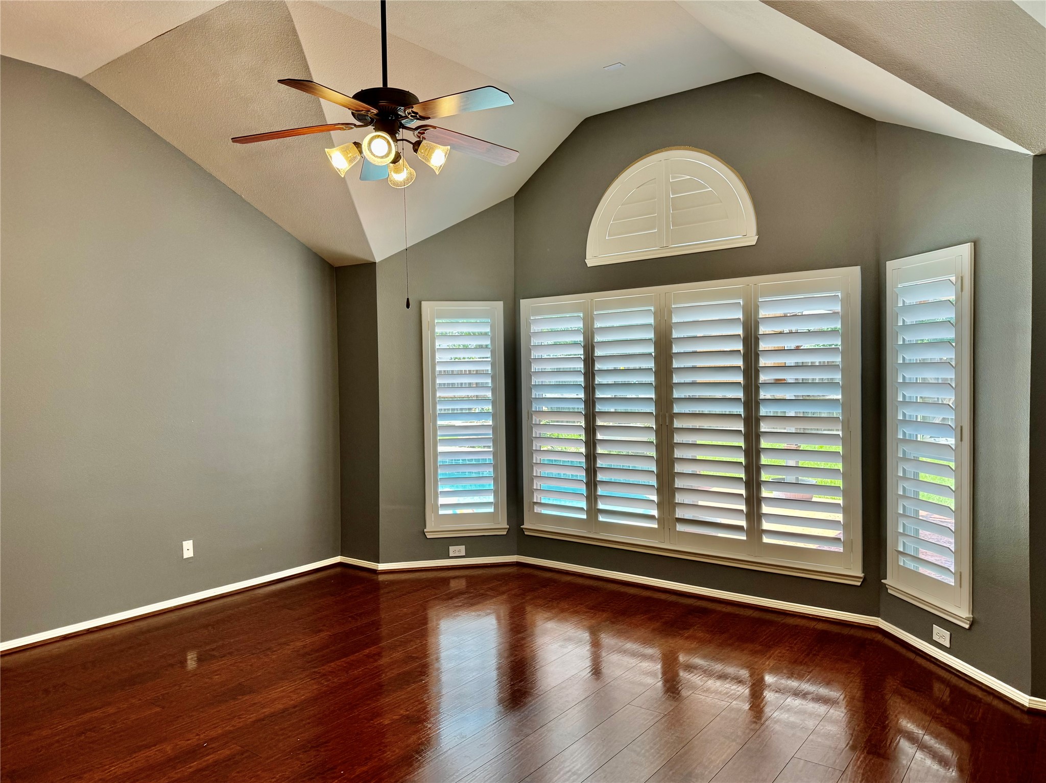 15434 Bay Tree Landing Cypress, TX 77429 - Photo 16 of 39 a view of a livingroom with a ceiling fan and window