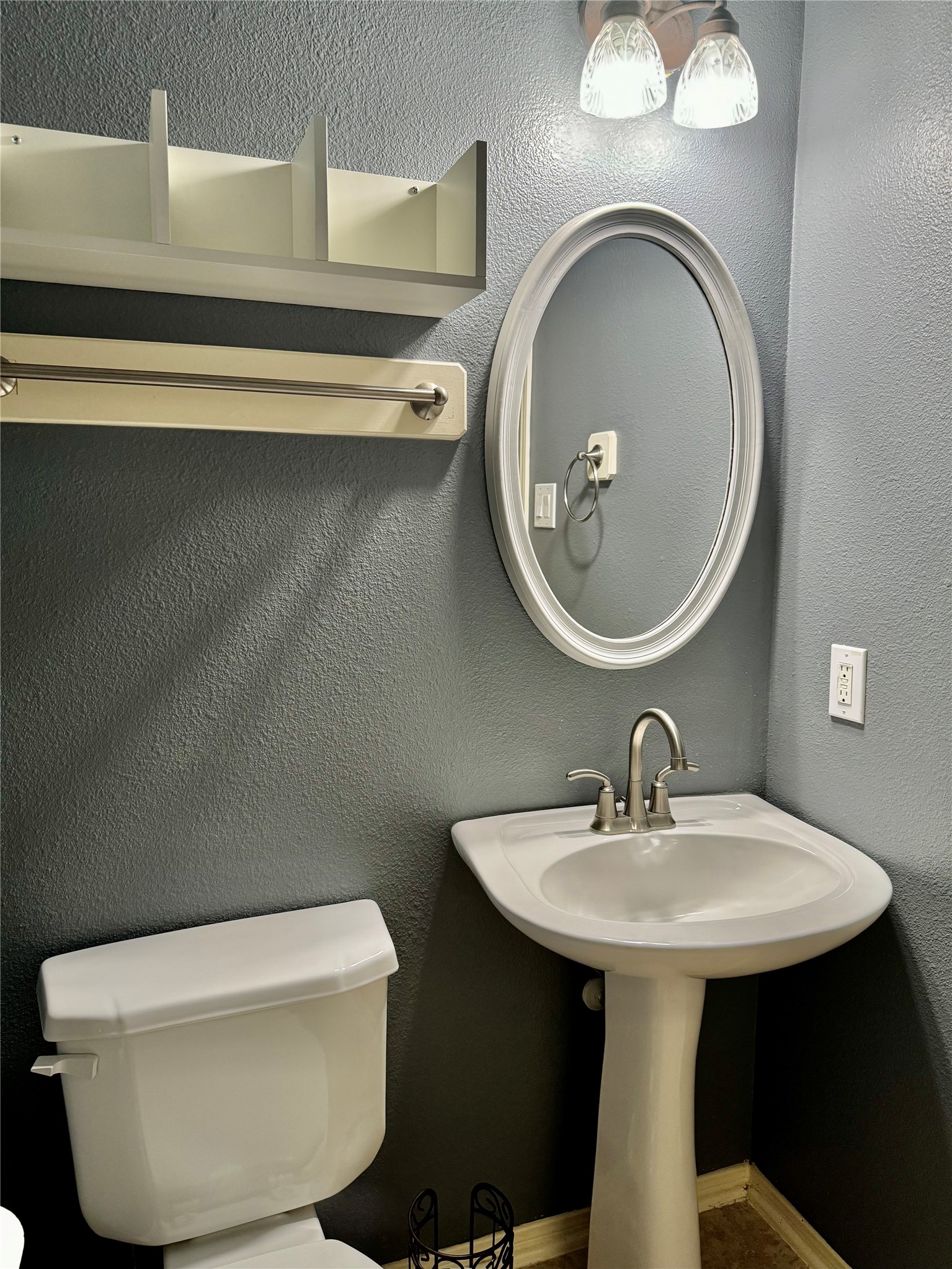 15434 Bay Tree Landing Cypress, TX 77429 - Photo 25 of 39 a bathroom with a toilet sink and mirror