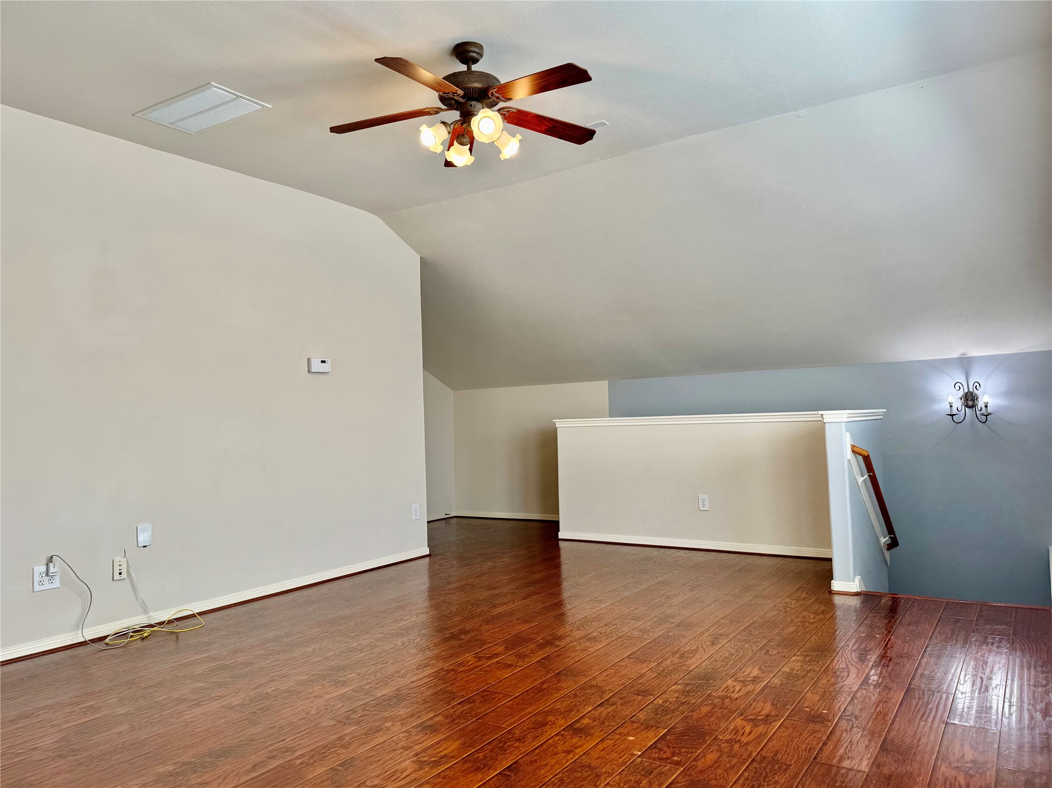 15434 Bay Tree Landing Cypress, TX 77429 - Photo 29 of 39 wooden floor in an empty room with a window