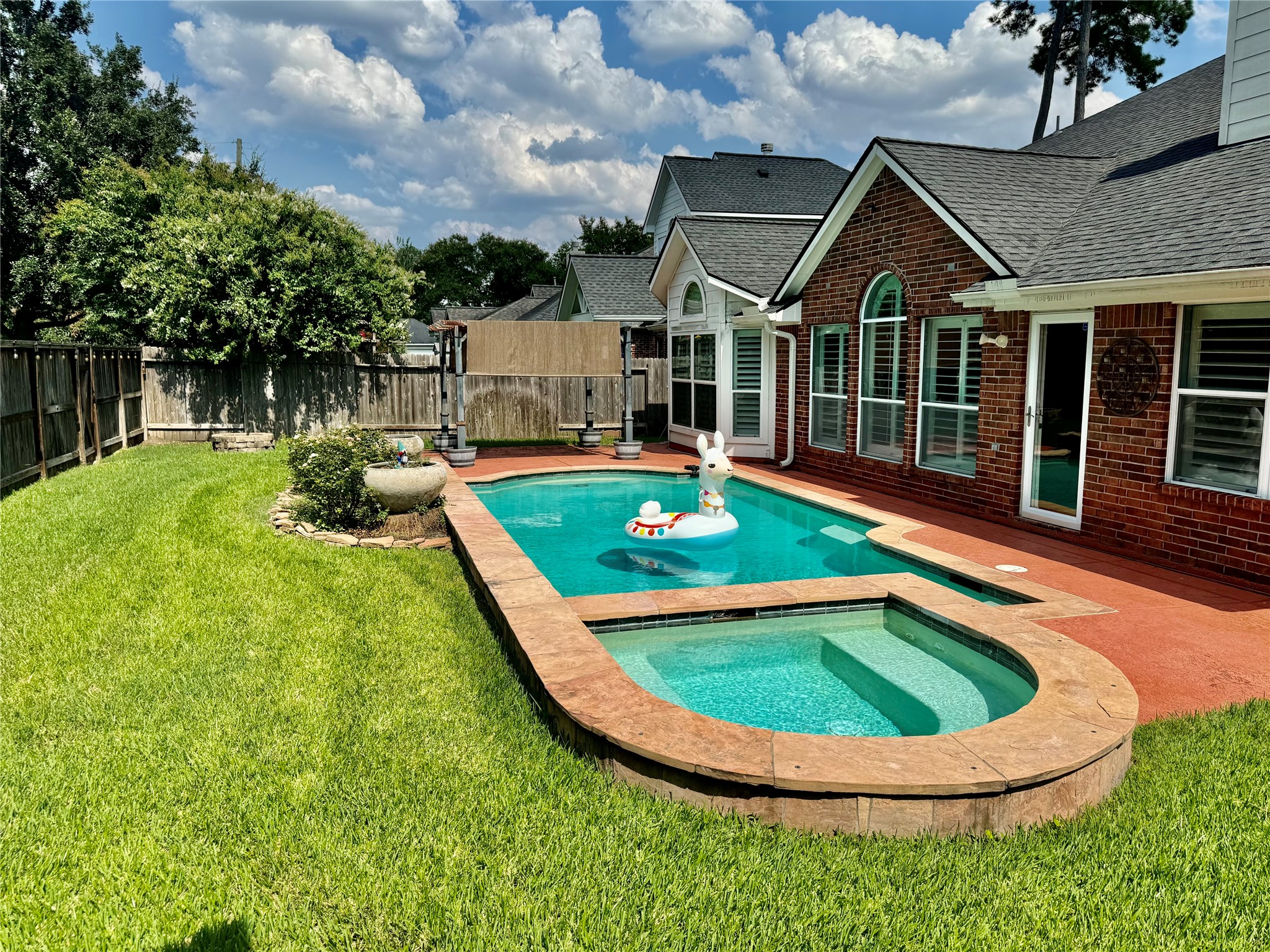 15434 Bay Tree Landing Cypress, TX 77429 - Photo 32 of 39 a view of a house with swimming pool