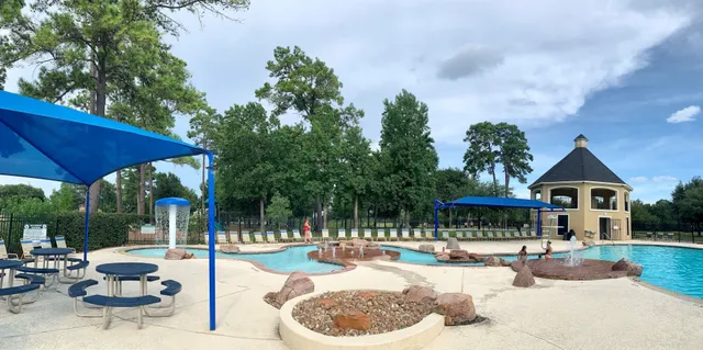 a view of swimming pool and lake