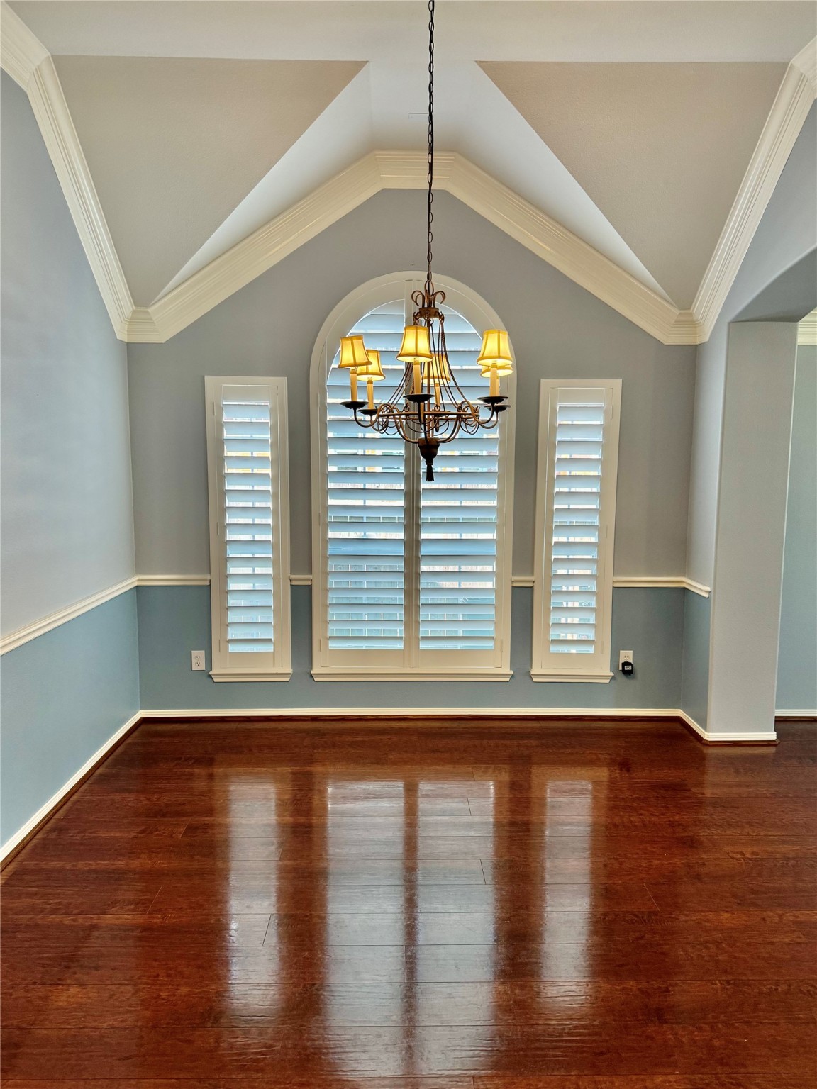 15434 Bay Tree Landing Cypress, TX 77429 - Photo 4 of 39 a view of a room with wooden floor and a window