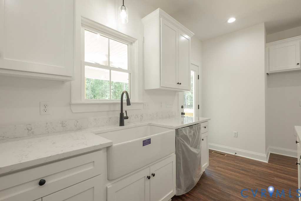 Lot 6 Tabscott Road Columbia, VA 23038 - Photo 19 of 42 Kitchen with white cabinets, dark wood finished fl