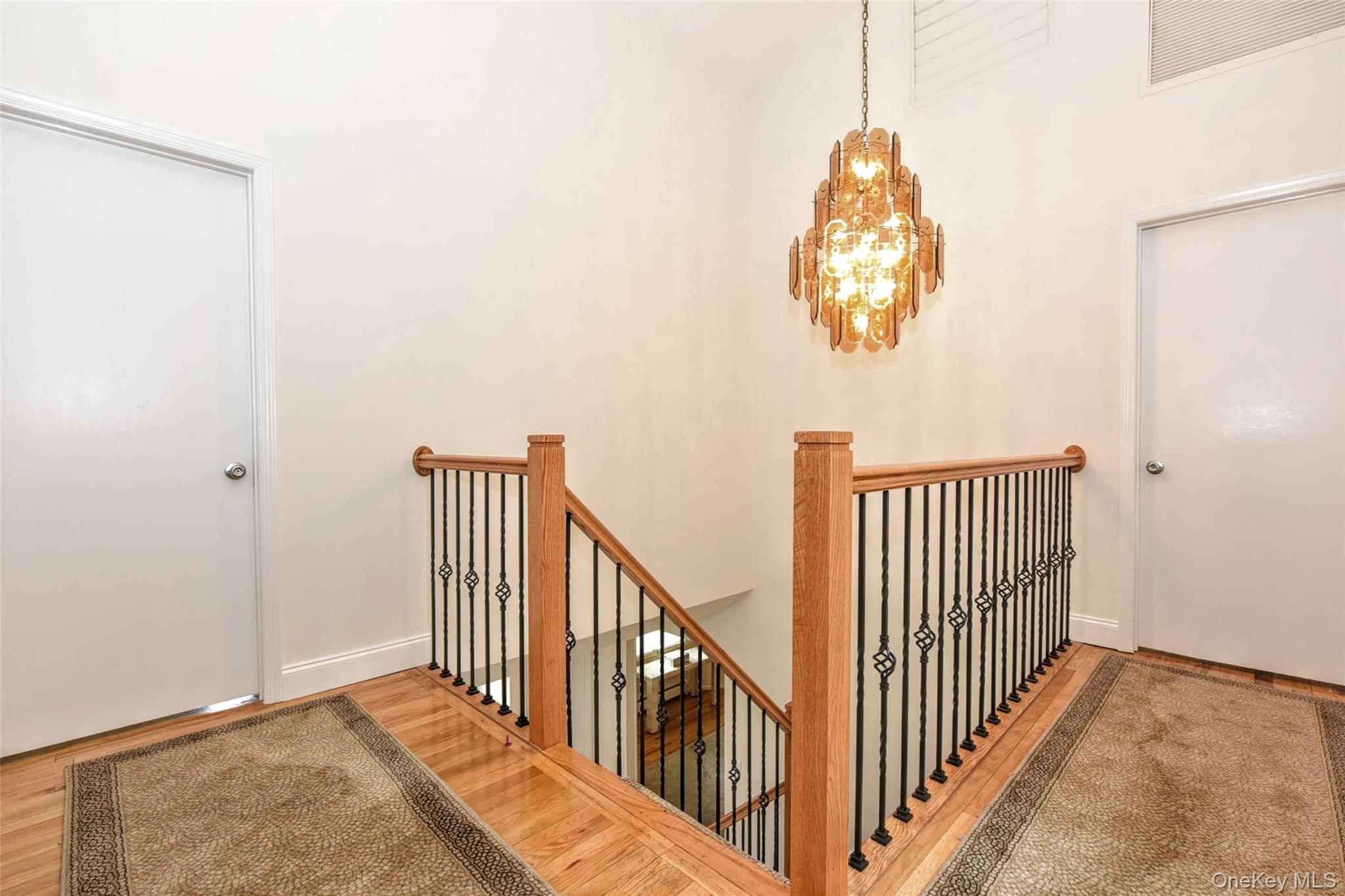 19 Church Road Monsey, NY 10952 - Photo 18 of 40 Second floor landing with stylish new bannister.