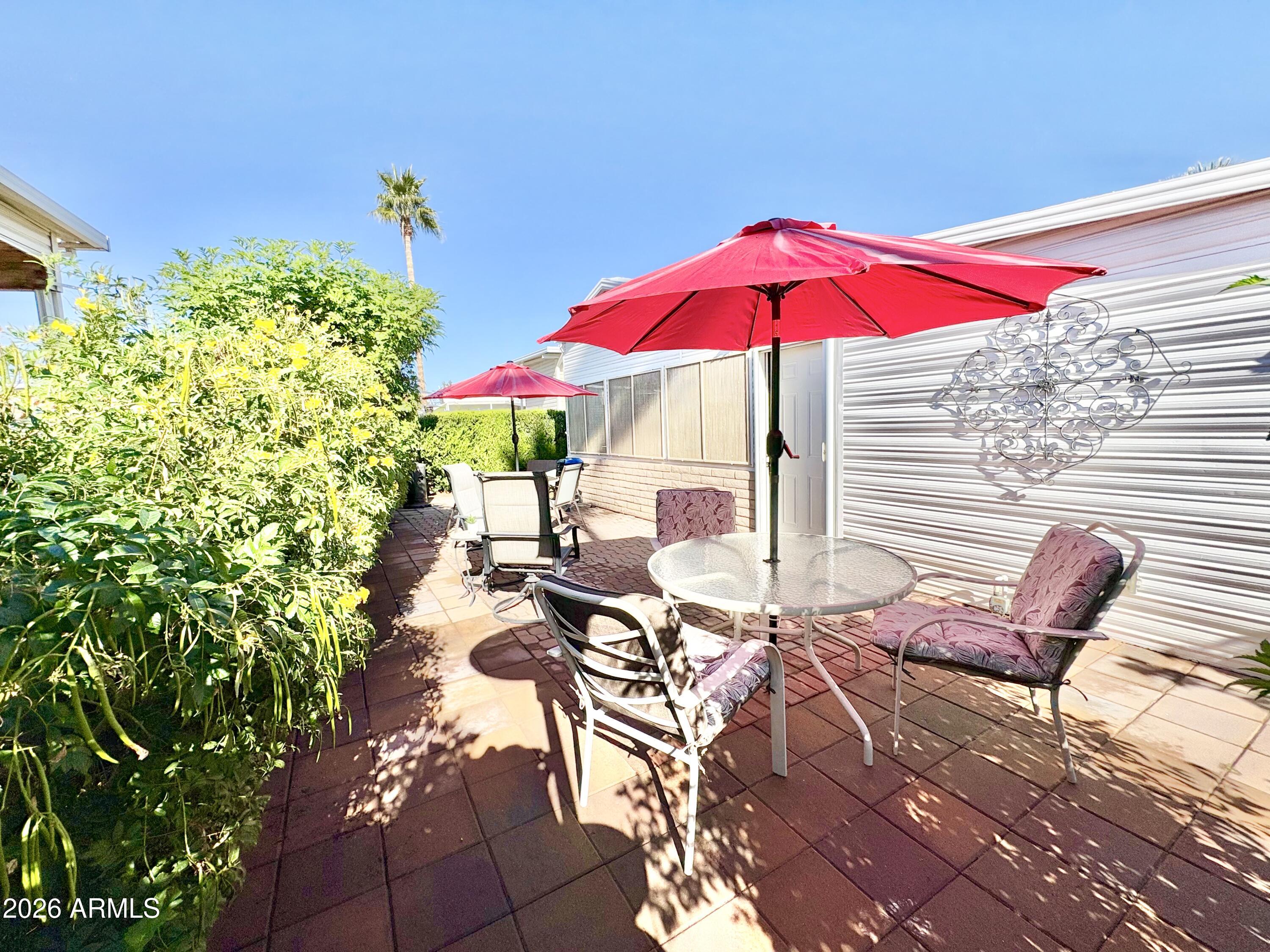 111 South Greenfield Road, Unit 589 Mesa, AZ 85206 - Photo 27 of 54 a view of yard with patio