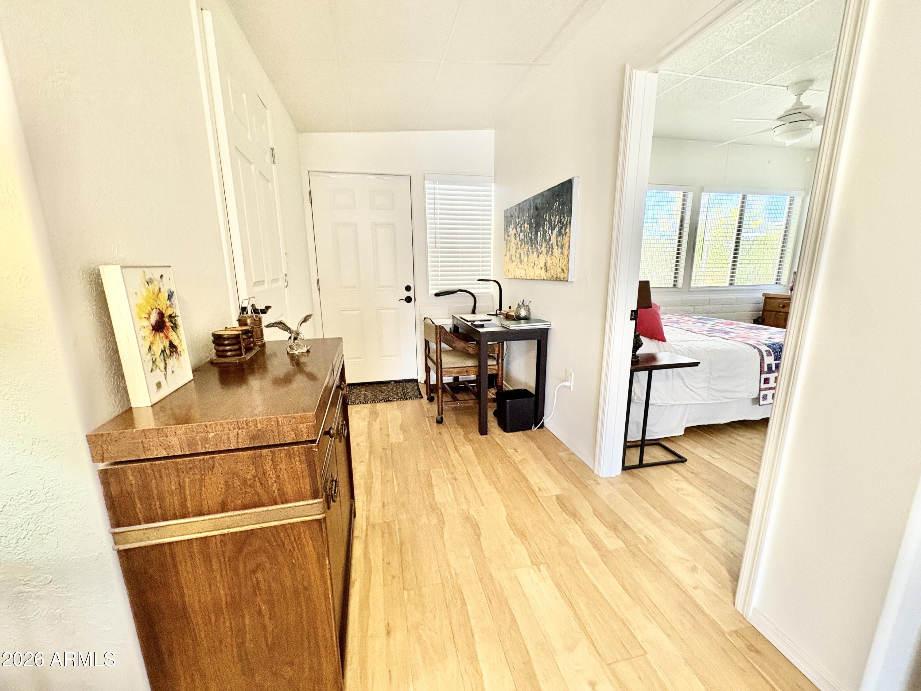 111 South Greenfield Road, Unit 589 Mesa, AZ 85206 - Photo 8 of 54 a living room with furniture and a table