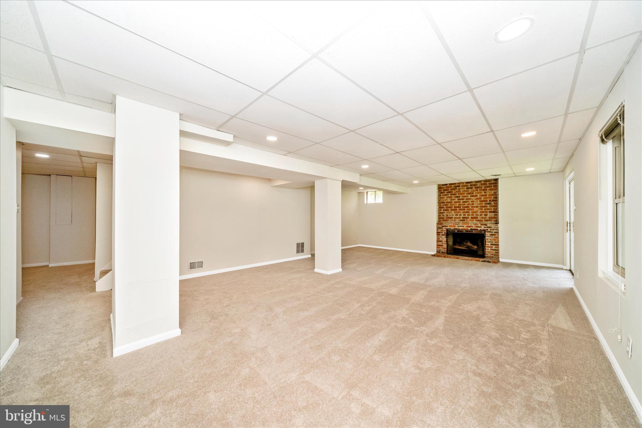 16000 Narrows Terrace Silver Spring, MD 20906 - Photo 36 of 54 a view of an empty room with a fireplace