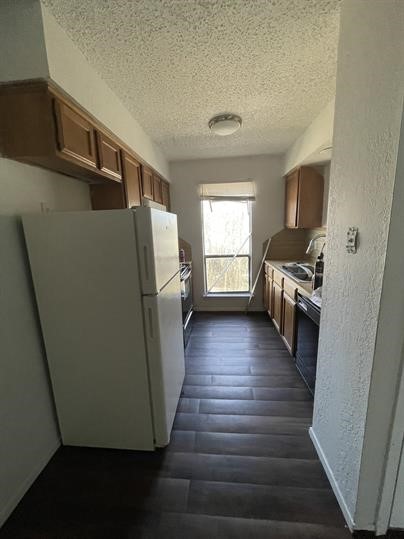 1101 Bois D'Arc Street, Unit D Lockhart, TX 78644 - Photo 1 of 8 a view of a livingroom with wooden floor and staircase