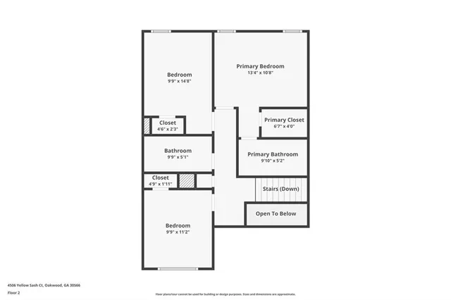 front view of a house with a small yard