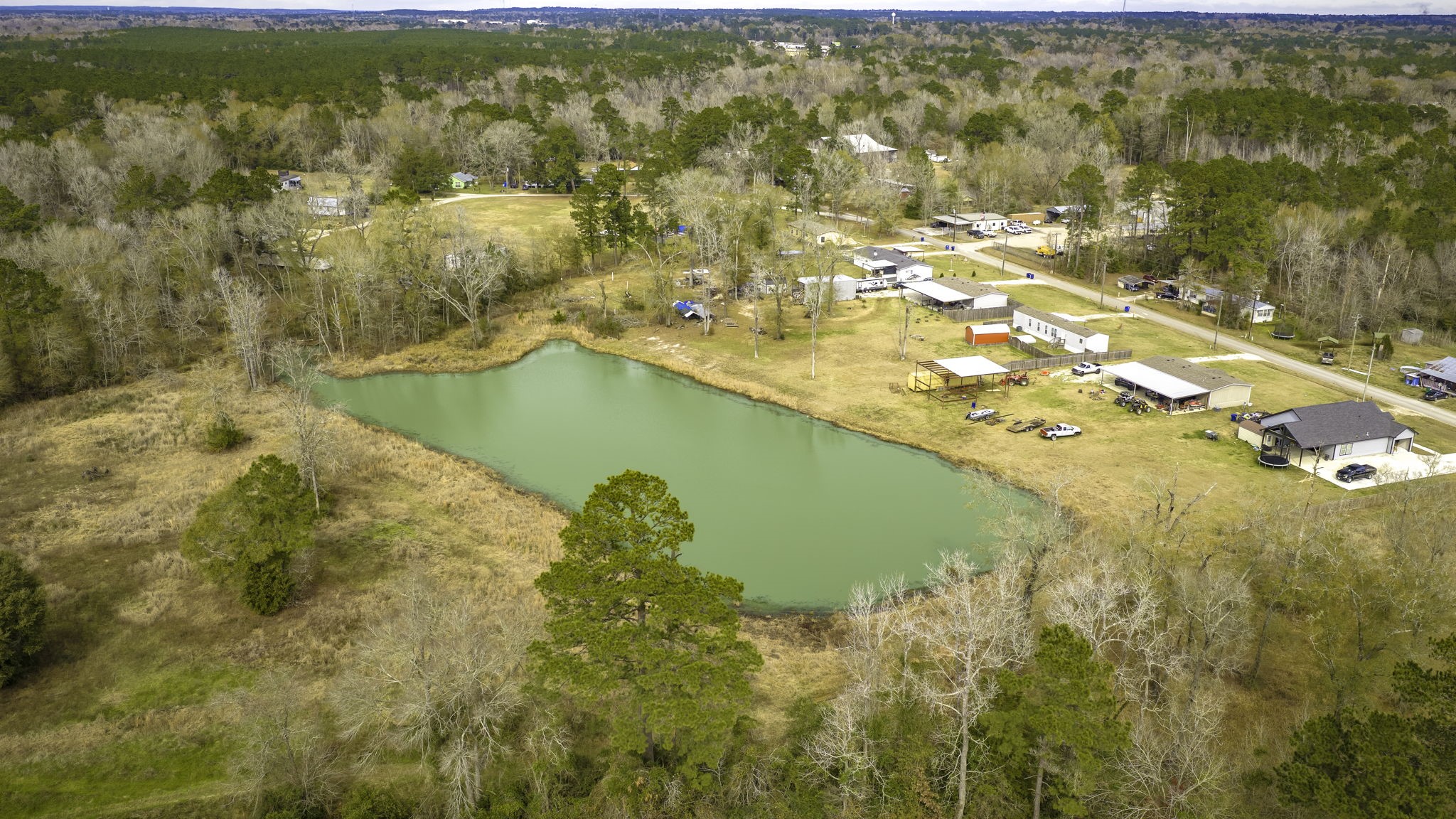 276 Hoot Owl Hollow Road Goodrich, TX 77335 - Photo 11 of 27 a view of a lake