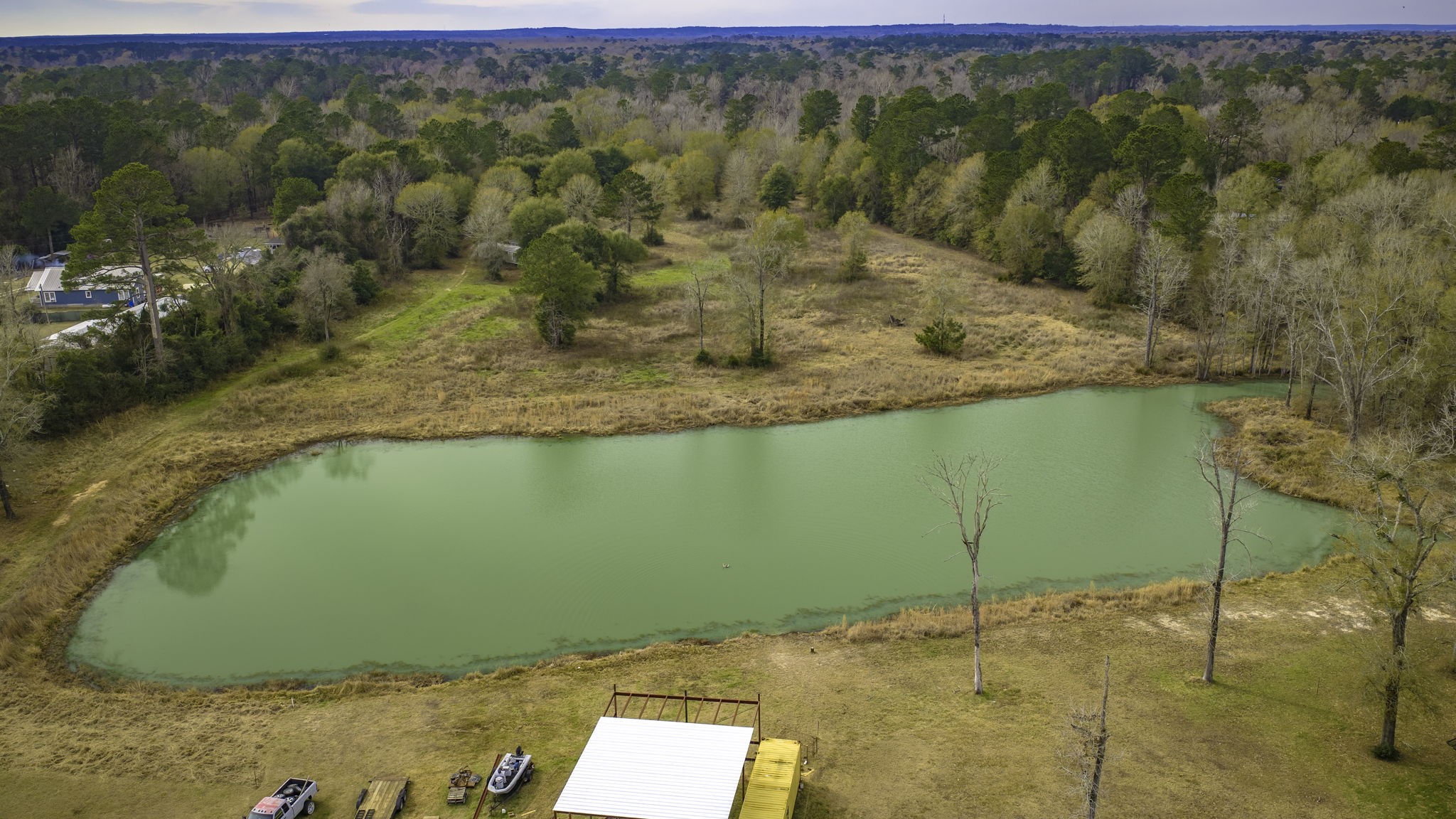 276 Hoot Owl Hollow Road Goodrich, TX 77335 - Photo 16 of 27 a view of a lake view