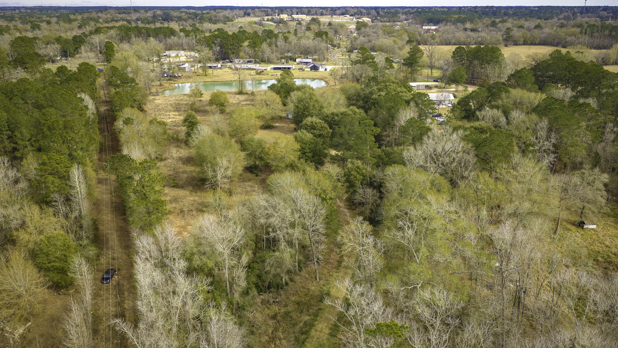 276 Hoot Owl Hollow Road Goodrich, TX 77335 - Photo 20 of 27 a view of residential houses with lake view