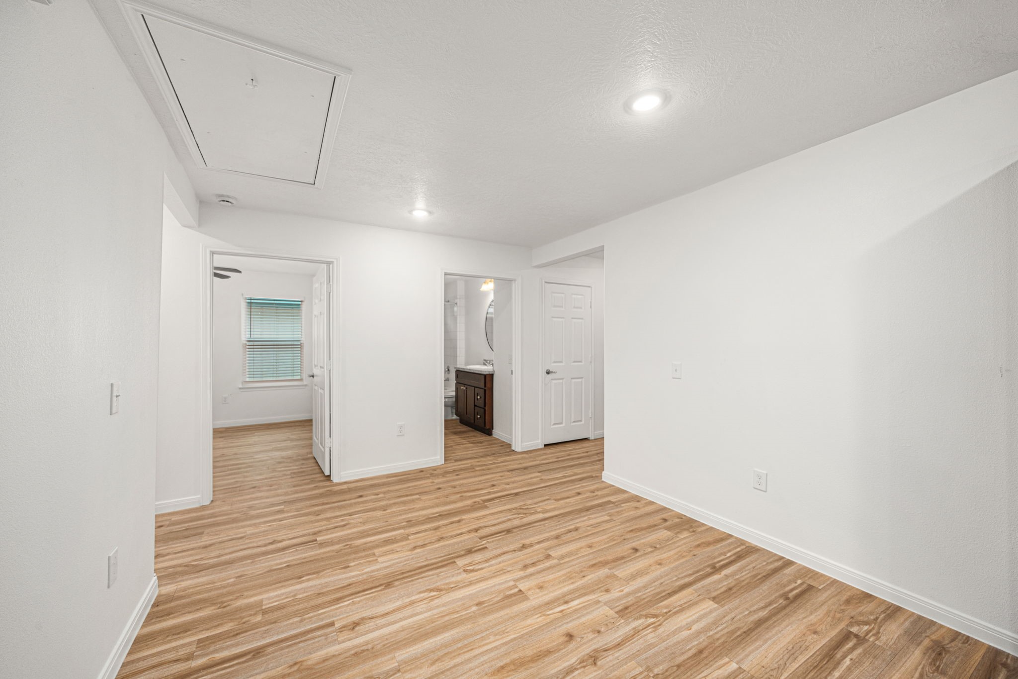 23507 Prairie Bird Drive Spring, TX 77373 - Photo 12 of 30 a view of an empty room with wooden floor