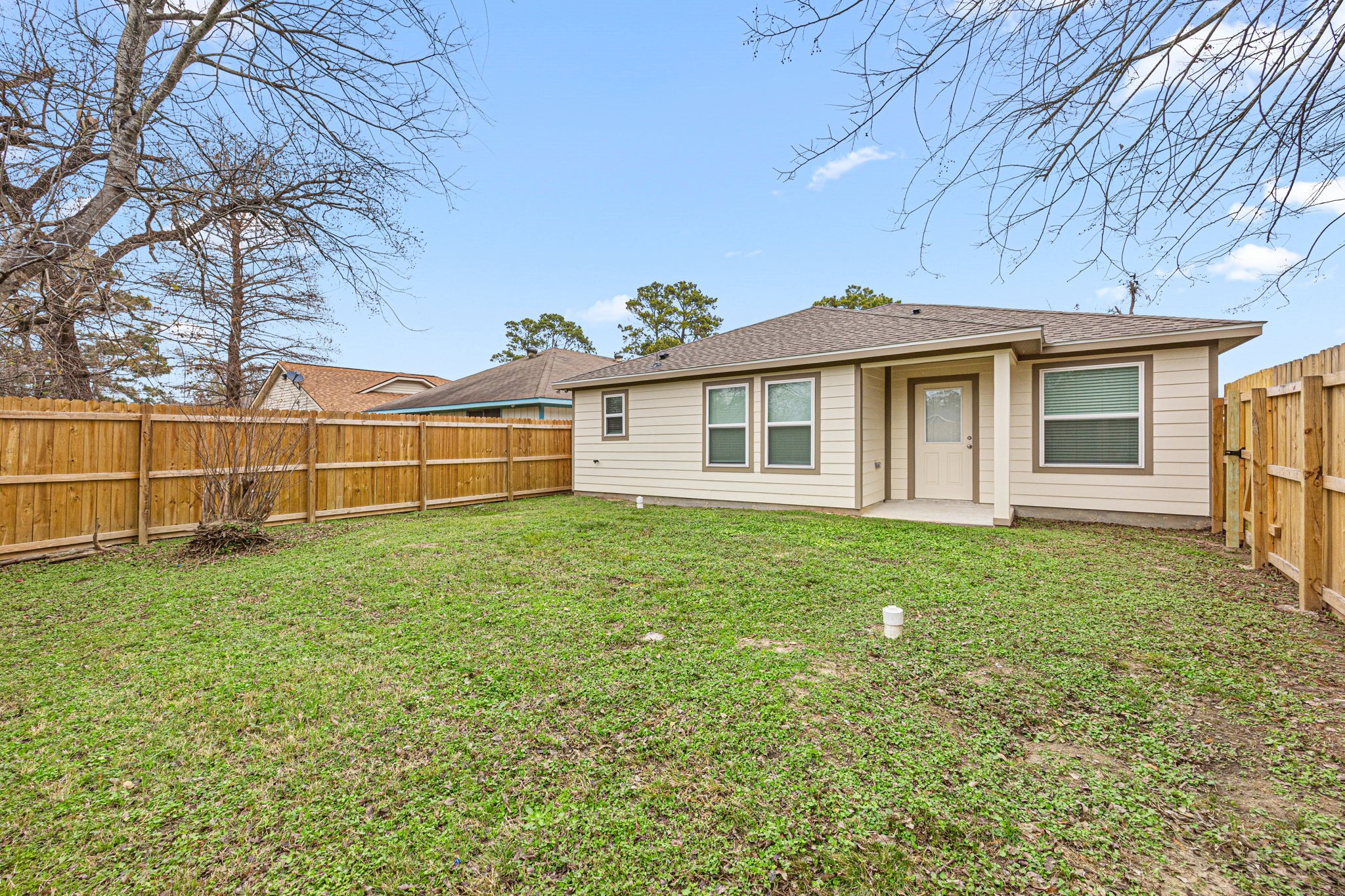 23507 Prairie Bird Drive Spring, TX 77373 - Photo 27 of 30 a view of a backyard with a garden
