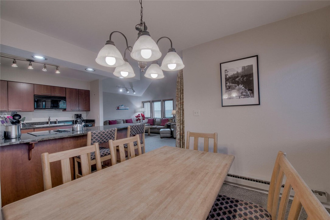 Open concept kitchen/dining/living areas