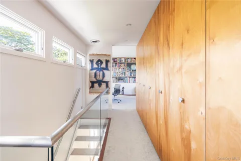 a workspace with furniture and book shelf