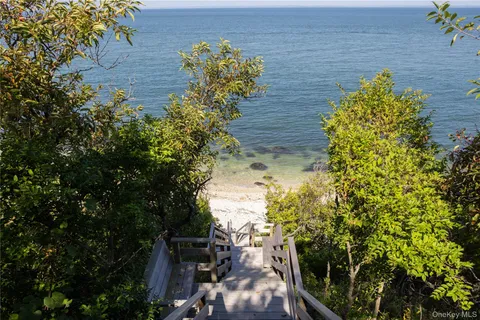 a view of balcony with wooden floor