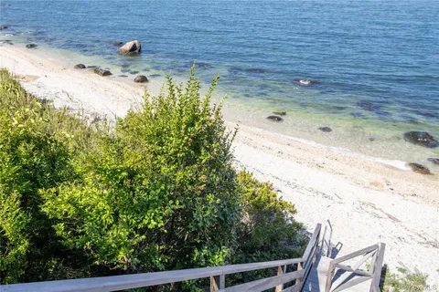 a view of a lake with a mountain in the back