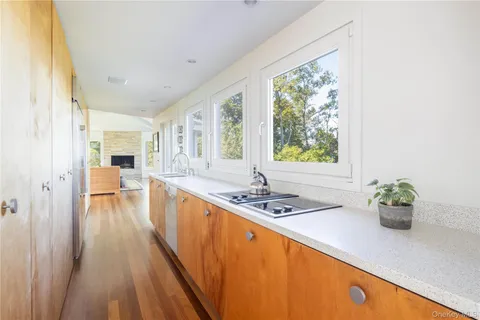 a view of a dining room with furniture and window