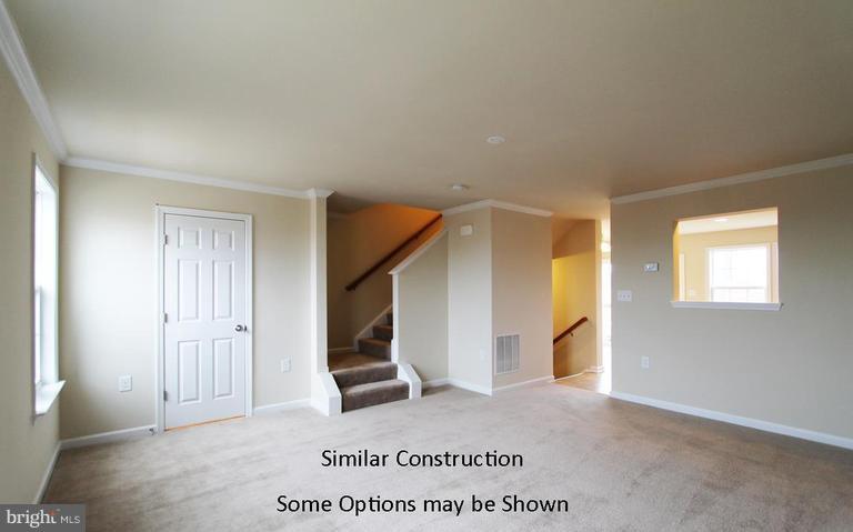 0 Rumbling Rock Road Hedgesville, WV 25427 - Photo 11 of 28 an entryway of a house and an empty room