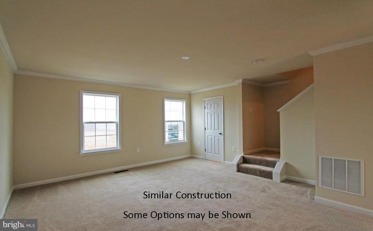 0 Rumbling Rock Road Hedgesville, WV 25427 - Photo 12 of 28 a view of an empty room with a window