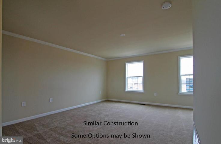 0 Rumbling Rock Road Hedgesville, WV 25427 - Photo 14 of 28 an empty room with windows
