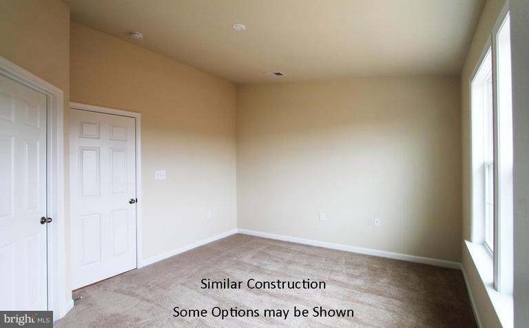 0 Rumbling Rock Road Hedgesville, WV 25427 - Photo 15 of 28 an empty room with a window