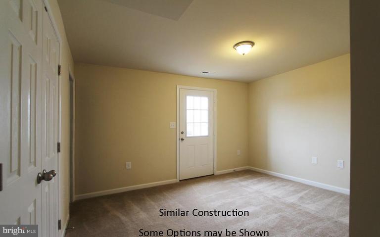 0 Rumbling Rock Road Hedgesville, WV 25427 - Photo 27 of 28 an empty room with a window