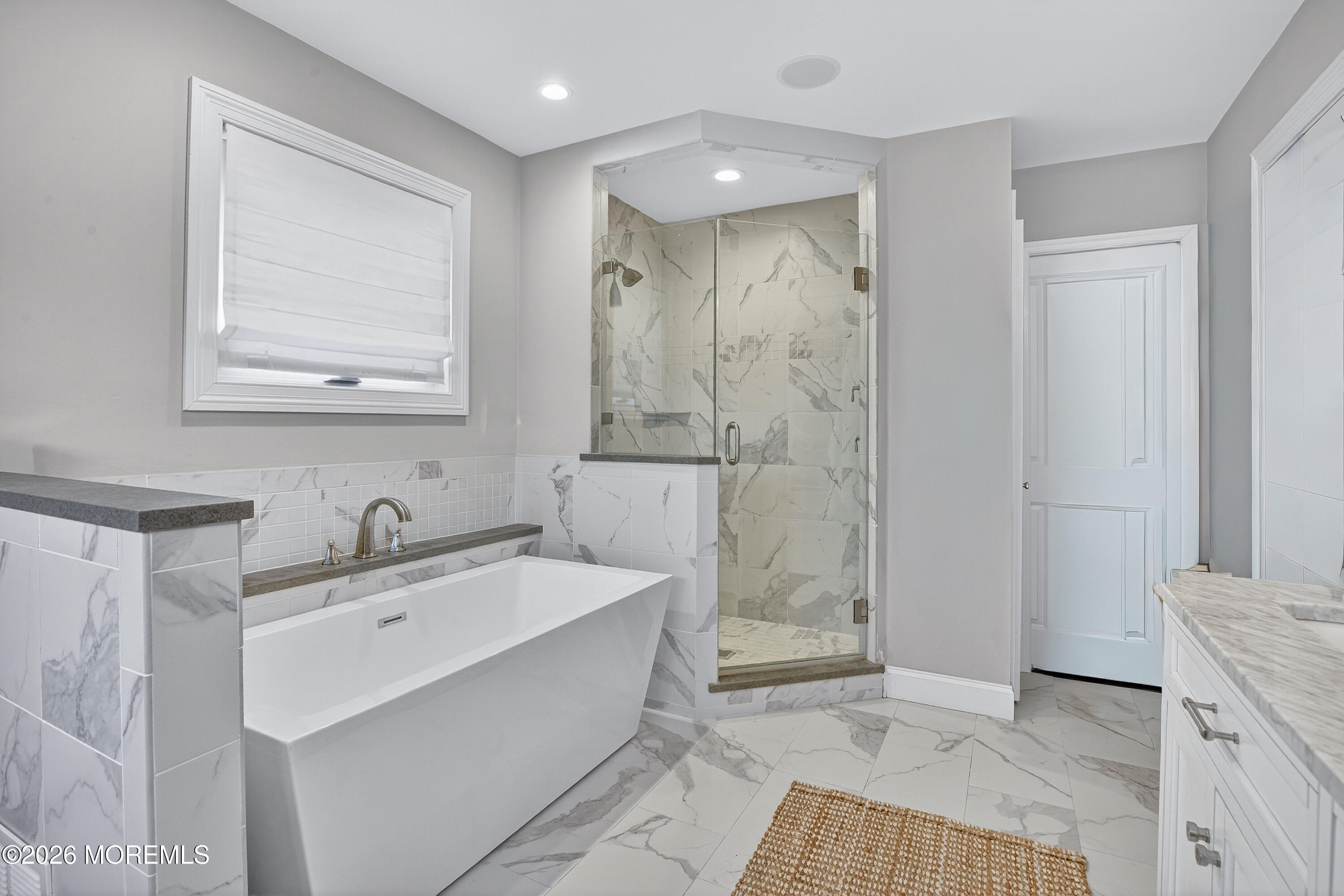 27 5th Street Highlands, NJ 07732 - Photo 17 of 62 a bathroom with a sink a toilet and shower