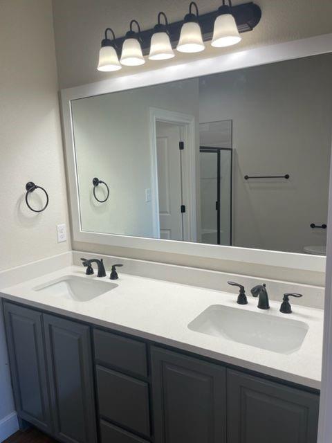 7326 Mountain View Road, Unit 7328 Abilene, TX 79602 - Photo 13 of 15 a bathroom with a sink and a mirror