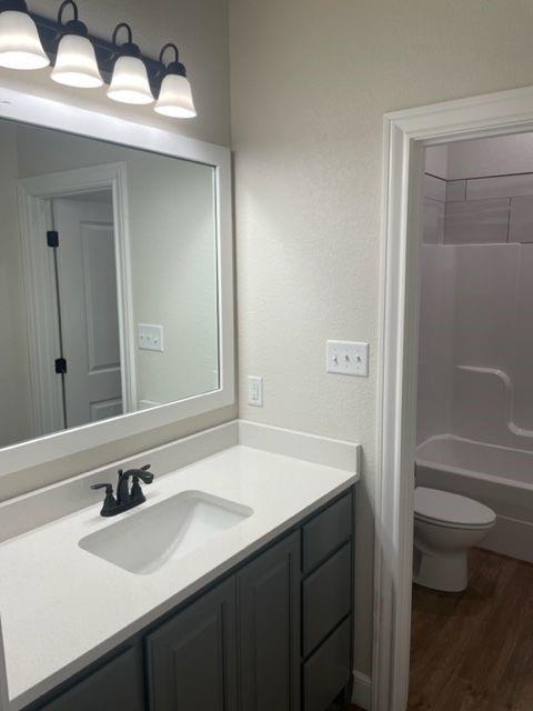 7326 Mountain View Road, Unit 7328 Abilene, TX 79602 - Photo 9 of 15 a bathroom with a sink and a mirror