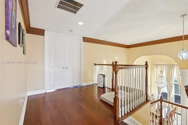 a view of entryway with wooden floor